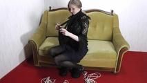 Sexy dressed girl bound with ropes 2/2