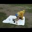 Being with Enni sitting at a lake wearing sexy shiny nylon rainwear (Video)