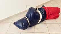 Breathplay Sebastien in a puffer jacket in hogtied.