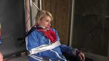 Watch Myxxxy bound and gagged in shiny nylon Rainwear with multiple gags and breath control