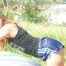 Stella tied and gagged outdoor in an car posing for you wearing a shiny nylon shorts and a top (Pics)