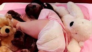 Emma with four teddy bears