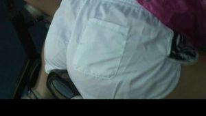 Katharina and Jenny in the fitness studio wearing sexy shiny nylon shorts and rain jackets (Video)