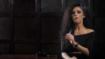 Gorgeous brunette Daria enjoying a cigarette in the hot smoking video