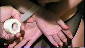 TAPED UP, HOG-TIED, TOE-TAPED SEXY HOSTAGE RAQUEL (D22-9)