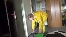 Pia wearing sexy yellow shiny nylon rainwear cleaning up the studio (Video)