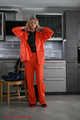 our new model Miss Alice in Farmerrain raingear and bondage