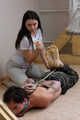 Hazel dominates Gregory, bit-gagged and hogtied with his hands in reverse prayer
