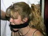 38 Yr OLD CASHIER ATTIC BOUND & GAGGED IN A BLACK LEATHER DRESS (D24-6)