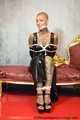 Miss Francine bound and gagged with layers of gags in a sexy PVC dress
