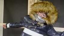 Lana tied and gagged in a shiny nylon Downjacket