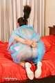 [From archive] Elsa - hogtaped in raincoat