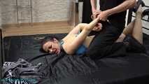 Topless hogtie at the bed