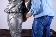 Jill tied and gagged by Sophie wearing shiny PVC suits (Pics)
