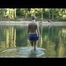 Jenny bathing in a lake and sun bathing wearing sexy adidas shiny nylon shorts and a bikini-top (Video)