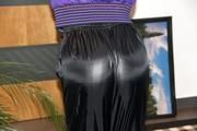 Isabelle tied and gagged in shiny nylon clothes