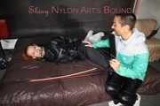 Part 2 of Stella overpowering intruder Ronja both wearing shiny nylon!