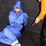 Jill bound and gagged by Simone in shiny nylon rainwear