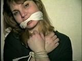 26 Yr OLD BARMAID IS WRISTS GAGGED, BAREFOOT, FEET TIED, HANDGAGGED, MOUTH STUFFED, & CLEAVE GAGGED (D52-15)