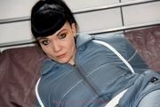 Jill tied and gagged in a shiny nylon oldschool skisuit