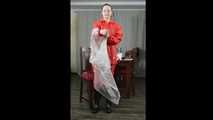Selfbondage in raingear and transparent raincoat