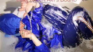 Sonja ties, gagges and hoodes herself in a bath tub wearing supersexy shiny nylon rainwear (Pics)