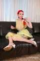 Morrigan - posing in yellow trash bag dress