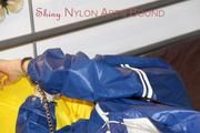 Lucy ties, gagges and hoodes herself on a bed wearing a sexy AGU rainnwear combination (Pics)