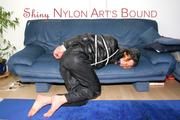 Katharina tied, gagged and hooded wearing a shiny nylon rain pants and a shiny nylon downjacket (Pics)
