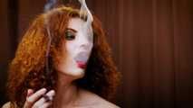 Wild and free girl Yuliya is definitely enjoying a strong 100mm black cigarette