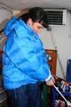 Jill tied and gagged in a down jacket