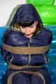 Jill tied and gagged in a shiny nylon down jacket 