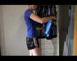 Watching Sonja coming home trying on several shiny nylon shorts to wear at home (Video)