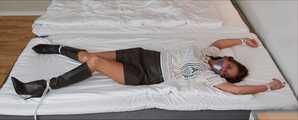 Spread eagle on bed