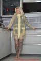 Miss Francine in yellow Schmuddelwedda raincoat