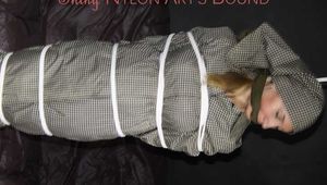 Sexy Sandra being tied and gagged overhead with ropes and a clothgag hodded wearing a sexy rainwear combination (Pics)