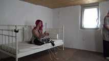Lana roped on bed 2