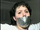19 Yr OLD JENNIFER IS MOUTH STUFFED, TAPE GAGGED, TIED WITH ARMS OUT AND TO 2 PILLARS & CLEAVE GAGGED (D48-10)d, bondage