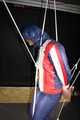 SEXY SONJA tied and gagged with ropes and a clothgag suspended wearing a sexy red/blue downwear combination (Pics)