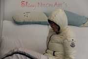 SEXY Jill wearing a WHITE rain pants and a WHITE down jacket lolling on the sofa playing with you (Pics)