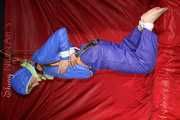 Sexy Sonja being tied and gagged with ropes and a clothgag hanging wearing a sexy rainwear combination (Pics)