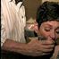 47 Yr OLD UNCOOPERATIVE BRAT LATINA HAIR DRESSER IS WRAP TAPE GAGGED, WIDE EYED GAG TALKING, BOUND UP WITH DUCT TAPE AND BAREFOOT (D59-11)