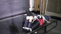 Marie bound and gagged in shiny nylon Rainwear
