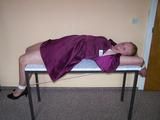 Hogtied on a table