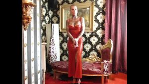 Miss Francine bound and gagged in a long red Latex dress  making off video part 2