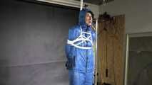 Myxxxy bound and gagged in a shiny nylon Skisuit