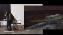 Mistress Cleo squirts cologne into the mouth of the slave lying in the toilet. Picture in Picture