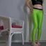 Green leggings in hallway