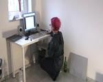 Marlin doing PC work wearing a hot rainwear combination (Video)