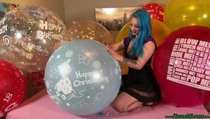 nail2pop big balloons on bed